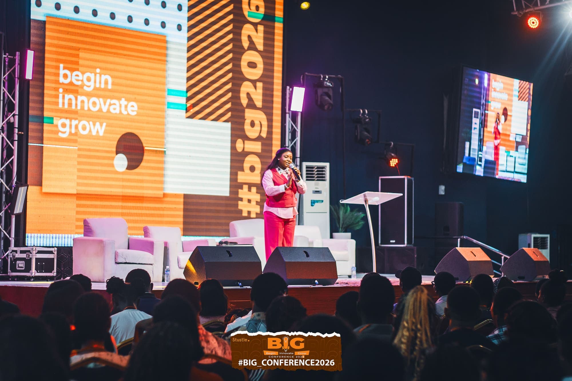 A speaker on the B.I.G. 2026 stage in front of the audience