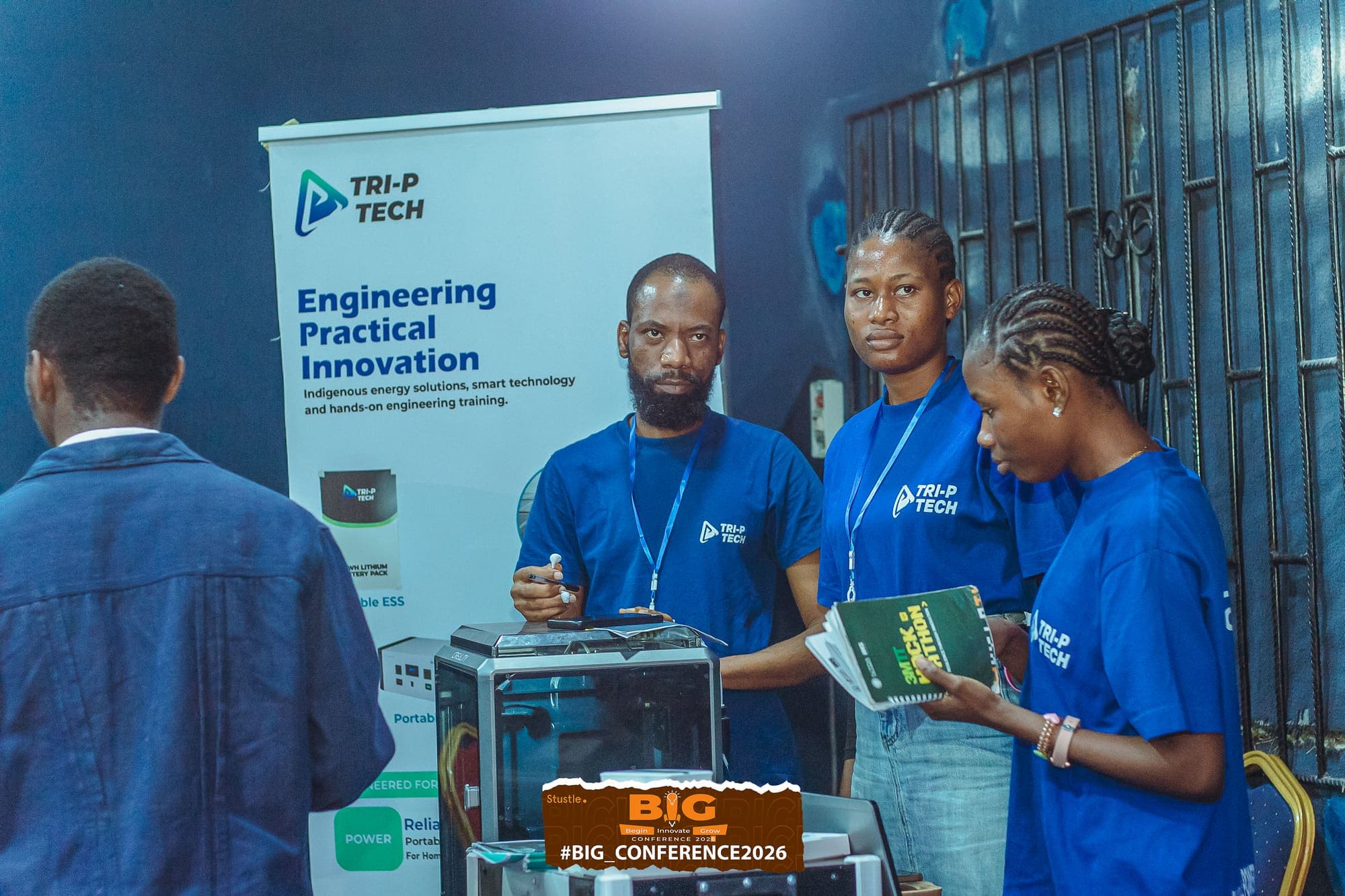 Attendees at the Tri-P Tech exhibition stand